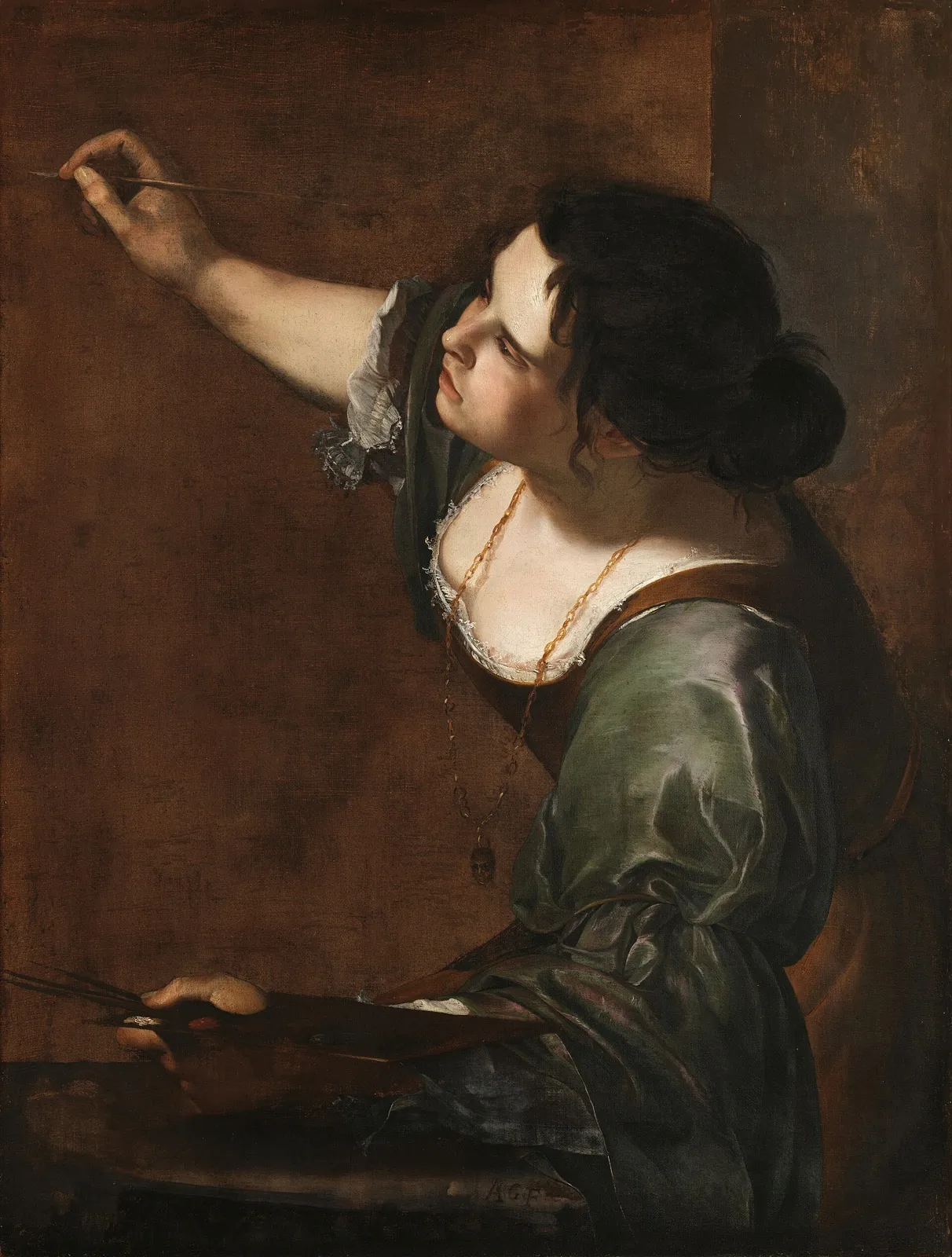 Woman in a green dress, seen in profile with her arm raised, painting on a dark canvas with a palette in hand