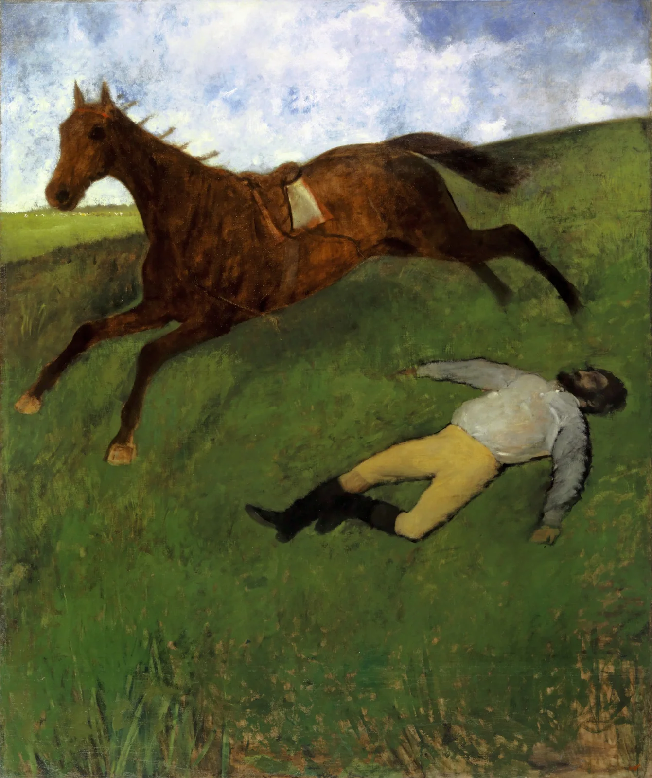 Riderless brown horse galloping across a green slope while the jockey lies on his back in the grass