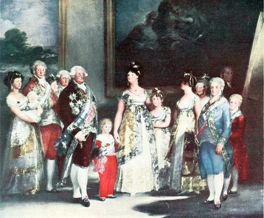 Royal family standing almost in a row in a palace room, in gowns, sashes and jewels; at center, a lady with two children