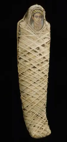 Mummy in linen bands crossed in diamonds, with a portrait of a young man in a gold wreath over the face