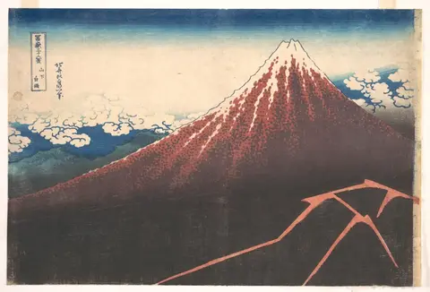 Monte Fuji de laderas rojizas sobre una base casi negra, con un rayo en zigzag abajo a la derecha y nubes blancas