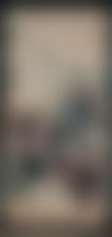 Hombre de larga barba negra juega en un tablero mientras un anciano le atiende el brazo, rodeado de ayudantes y comida