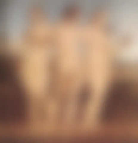 Three nude women, arms around each other’s shoulders, hold small red spheres in a landscape of hills and water