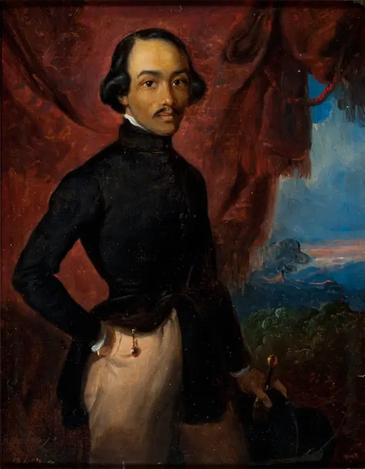 Man with black hair and a moustache, in a black jacket and pale trousers, before a red curtain and a sunset landscape