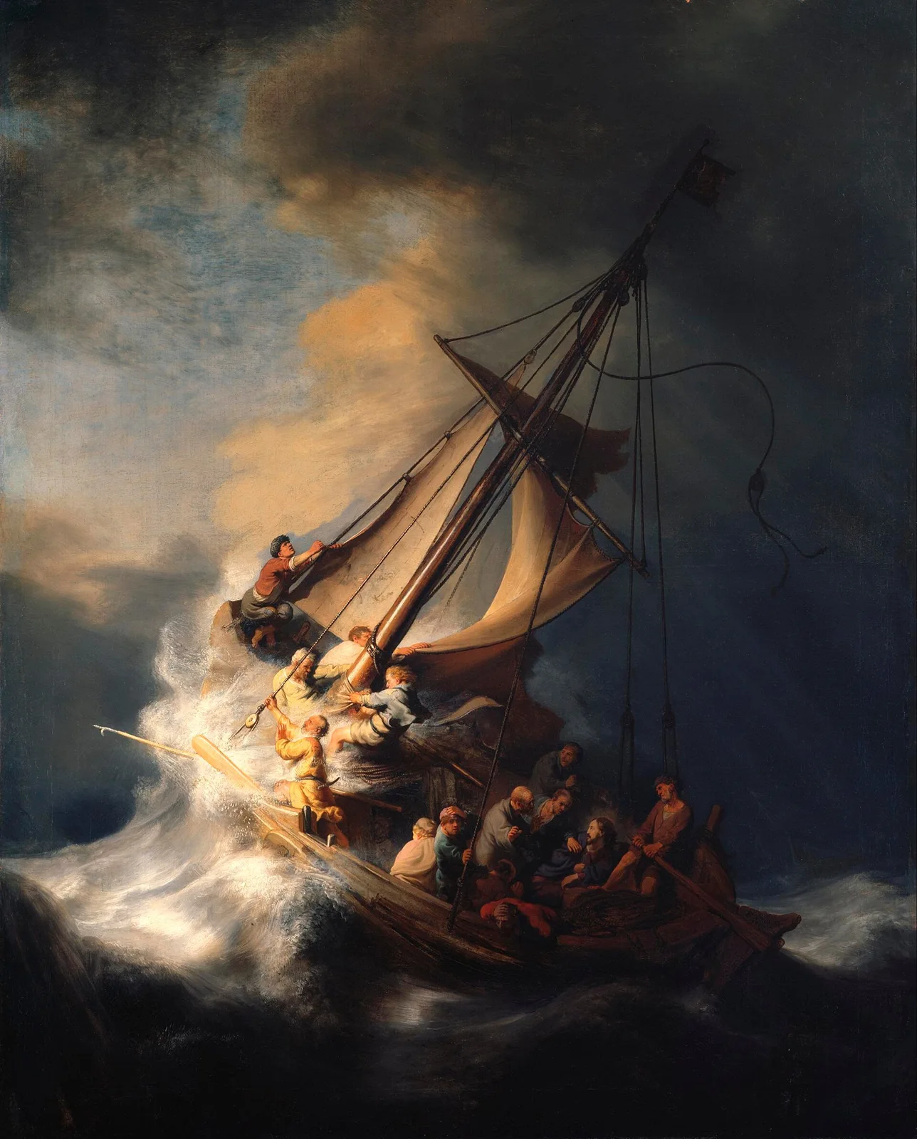 Barca de vela inclinada por una ola enorme bajo nubes negras, con hombres que luchan con cuerdas y timón a bordo
