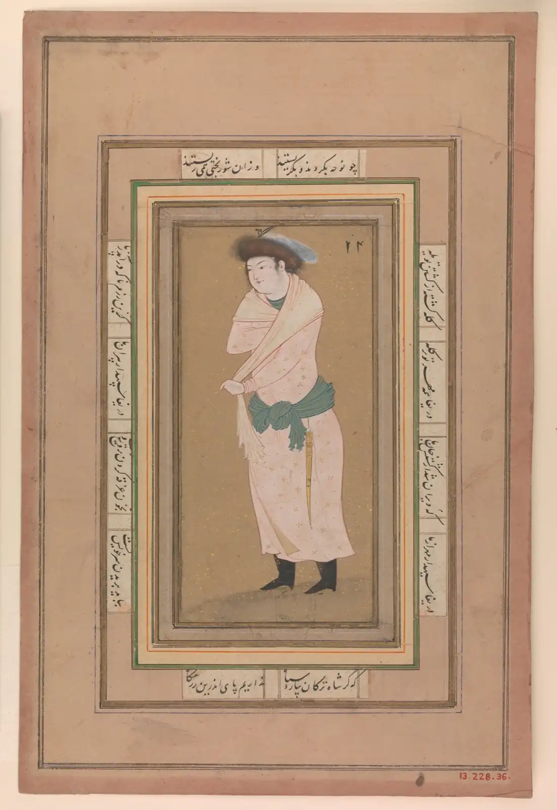 Young man standing in a fur hat, pale pink robe with gold motifs, light shawl, green sash and dagger, amid borders
